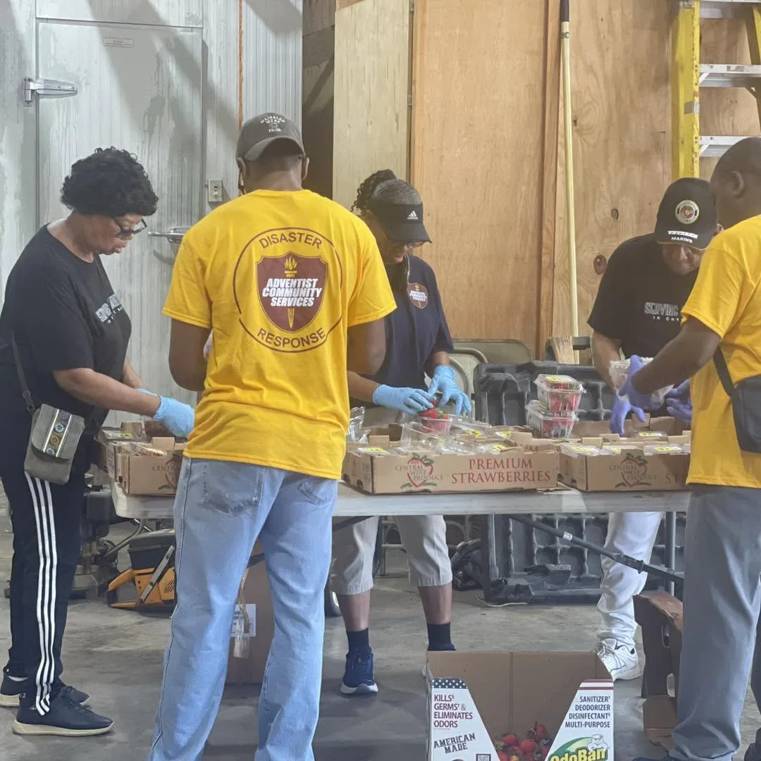 ACS Disaster Response volunteers preparing food donations