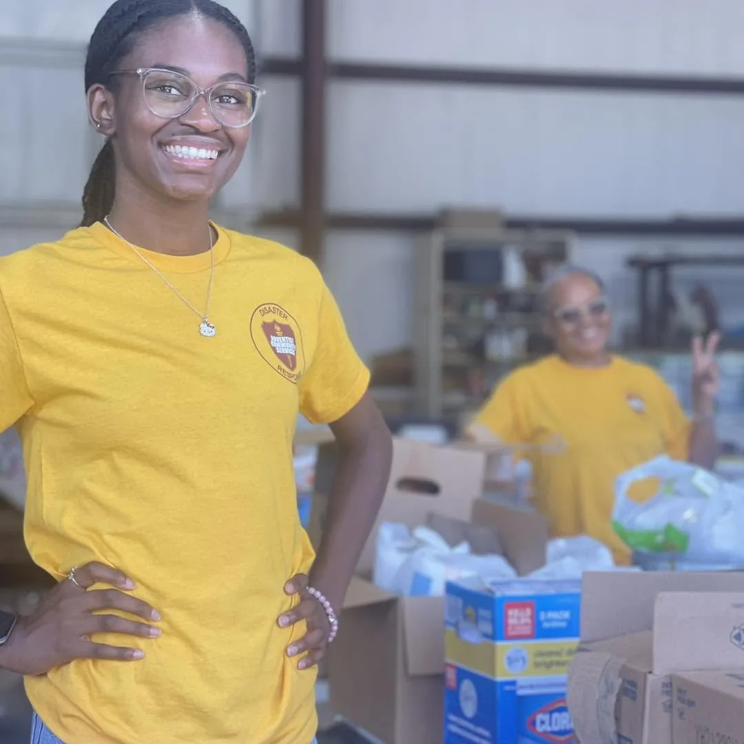 ACS volunteer smiling at distribution center