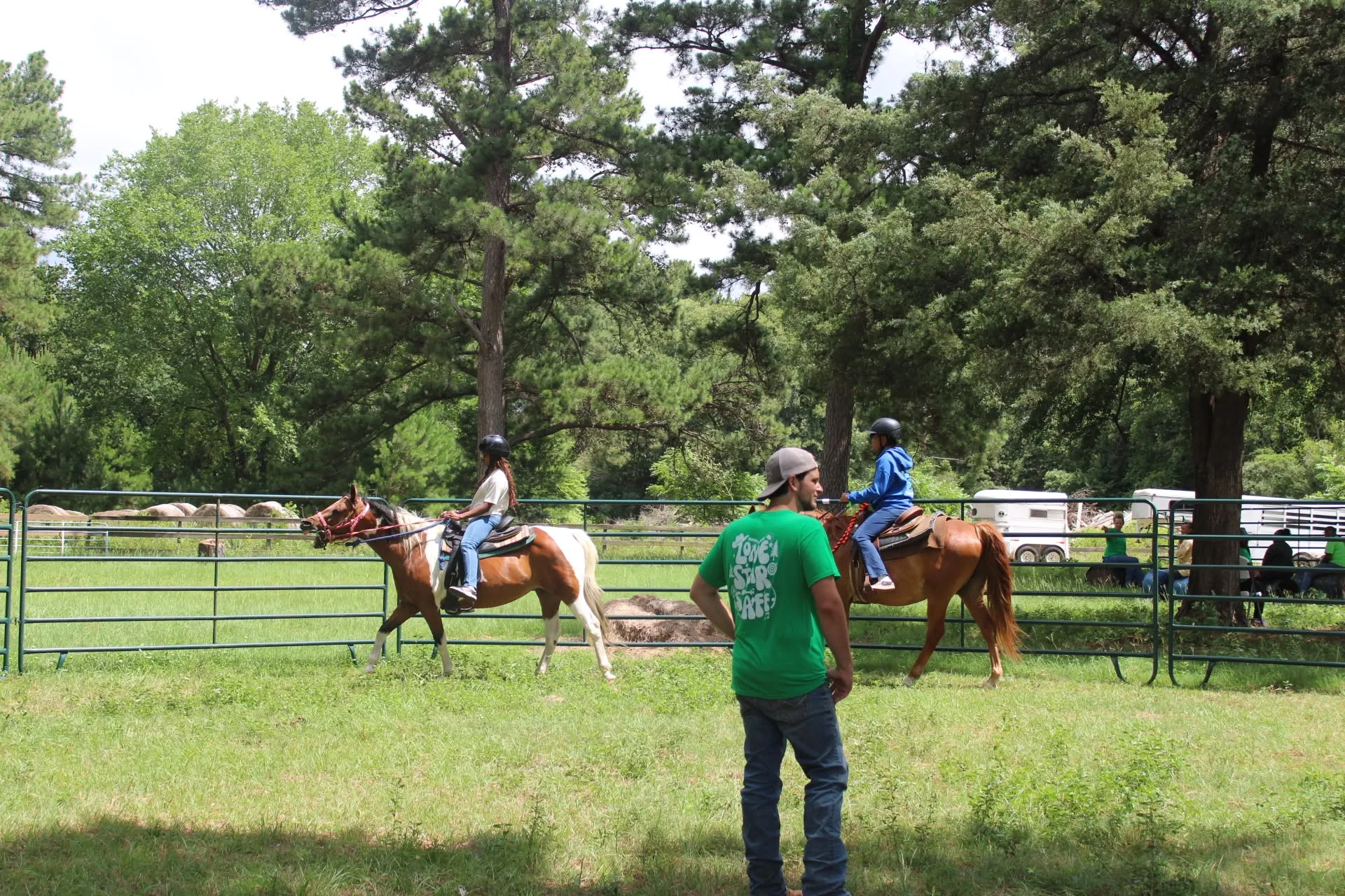 Campers horseback riding at Lone Star Camp